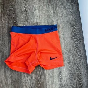 Orange Nike Pro Shorts